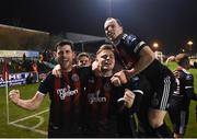 25 February 2019; Dinny Corcoran celebrates after scoring his side's first goal with his Bohemians team-mates Conor Levingston, centre, and Derek Pender, top, during the SSE Airtricity League Premier Division match between Bohemians and Shamrock Rovers at Dalymount Park in Dublin. Photo by Stephen McCarthy/Sportsfile