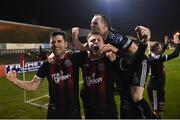 25 February 2019; Dinny Corcoran celebrates after scoring his side's first goal with his Bohemians team-mates Conor Levingston, centre, and Derek Pender, top, during the SSE Airtricity League Premier Division match between Bohemians and Shamrock Rovers at Dalymount Park in Dublin. Photo by Stephen McCarthy/Sportsfile