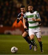 25 February 2019; Greg Bolger of Shamrock Rovers in action against Daniel Mandroiu of Bohemians during the SSE Airtricity League Premier Division match between Bohemians and Shamrock Rovers at Dalymount Park in Dublin. Photo by Ben McShane/Sportsfile