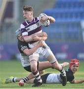 27 February 2019; Hugh Wilkinson of Clongowes Wood is tackled by Tom Waters of Newbridge College during the Bank of Ireland Leinster Schools Junior Cup Quarter-Final match between Newbridge College and Clongowes Wood College at Energia Park in Donnybrook, Dublin. Photo by Matt Browne/Sportsfile