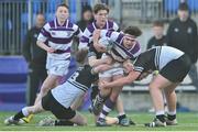 27 February 2019; Flavio Macari of Clongowes Wood is tackled by Calum Corcoran and Patrick Stapleton of Newbridge College during the Bank of Ireland Leinster Schools Junior Cup Quarter-Final match between Newbridge College and Clongowes Wood College at Energia Park in Donnybrook, Dublin. Photo by Matt Browne/Sportsfile