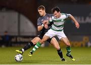 1 March 2019; Dane Massey of Dundalk in action against Joel Coustrain of Shamrock Rovers during the SSE Airtricity League Premier Division match between Shamrock Rovers and Dundalk at Tallaght Stadium in Dublin. Photo by Seb Daly/Sportsfile