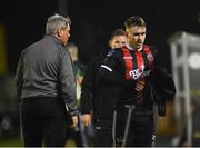 1 March 2019; Luke Wade-Slater of Bohemians walks past Bohemians manager Keith Long after being substituted  during the SSE Airtricity League Premier Division match between Waterford and Bohemians at the RSC in Waterford. Photo by Harry Murphy/Sportsfile