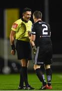1 March 2019; Referee Robert Hennessy speaks with Derek Pender of Bohemians after he received a yellow card during the SSE Airtricity League Premier Division match between Waterford and Bohemians at the RSC in Waterford. Photo by Harry Murphy/Sportsfile