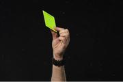 1 March 2019; Referee Robert Harvey shows the yellow card during the SSE Airtricity League Premier Division match between UCD and St Patrick's Athletic at the UCD Bowl in Belfield, Dublin. Photo by Piaras Ó Mídheach/Sportsfile