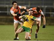 2 March 2019; Jamie Brennan of Donegal  in action against James Morgan, left, and Charlie Vernon of Armagh  during the Allianz Football League Division 2 Round 5 match between Donegal and Armagh at MacCumhail Park in Ballybofey, Donegal. Photo by Oliver McVeigh/Sportsfile