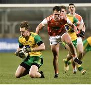 2 March 2019; Hugh McFadden of Donegal in action against Stephen Sheridan of Armagh during the Allianz Football League Division 2 Round 5 match between Donegal and Armagh at MacCumhail Park in Ballybofey, Donegal. Photo by Oliver McVeigh/Sportsfile