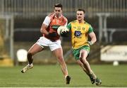 2 March 2019; Stefan Campbell of Armagh in action against Leo McLoone of Donegal during the Allianz Football League Division 2 Round 5 match between Donegal and Armagh at MacCumhail Park in Ballybofey, Donegal. Photo by Oliver McVeigh/Sportsfile