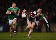 2 March 2019; Ciarán Duggan of Galway in action against Donal Vaughan, left, and Keith Higgins of Mayo during the Allianz Football League Division 1 Round 5 match between Mayo and Galway at Elverys MacHale Park in Castlebar, Mayo. Photo by Piaras Ó Mídheach/Sportsfile