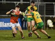 2 March 2019; Joe McElroy of Armagh in action against Michael Murphy of Donegal  during the Allianz Football League Division 2 Round 5 match between Donegal and Armagh at MacCumhail Park in Ballybofey, Donegal. Photo by Oliver McVeigh/Sportsfile