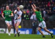 3 March 2019; Neil Flynn of Kildare passes under pressure from Cillian O'Sullivan, left, and Shane Gallagher of Meath during the Allianz Football League Division 2 Round 5 match between Meath and Kildare at Páirc Táilteann, in Navan, Meath. Photo by Piaras Ó Mídheach/Sportsfile