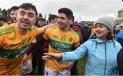 3 March 2019; Leitrim players Dean McGovern and Emlyn Mulligan celebrate amongst fans after the Allianz Football League Division 4 Round 5 match between Leitrim and London at Avantcard Páirc Seán Mac Diarmada in Carrick-on-Shannon, Co. Leitrim. Photo by Oliver McVeigh/Sportsfile