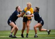 8 March 2019; Amy Johnston of DCU in action against Katie Rafferty, left, and Niamh McDonald of Ulster University during the Gourmet Food Parlour Lagan Cup Final match between Ulster University and Dublin City University at TU Dublin Broombridge Sports Grounds in Dublin. Photo by Harry Murphy/Sportsfile