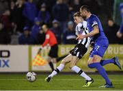 8 March 2019; Daniel Kelly of Dundalk shoots to score his side's third goal, despite pressure from Damien Delaney of Waterford, during the SSE Airtricity League Premier Division match between Dundalk and Waterford at Oriel Park in Dundalk, Co Louth. Photo by Seb Daly/Sportsfile