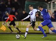 8 March 2019; Daniel Kelly of Dundalk on his way to scoring his side's third goal, despite pressure from Damien Delaney of Waterford, during the SSE Airtricity League Premier Division match between Dundalk and Waterford at Oriel Park in Dundalk, Co Louth. Photo by Seb Daly/Sportsfile