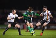 8 March 2019; Eoghan Stokes of Derry City in action against Derek Pender, left, and Robert McCourt of Bohemians during the SSE Airtricity League Premier Division match between Bohemians and Derry City at Dalymount Park in Dublin. Photo by Eóin Noonan/Sportsfile