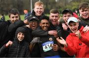 9 March 2019; Efron Giddey of Le Chéile Tyrrelstown, Dublin, celebrates with supporters after winning the Senior Boys event at the Irish Life Health All Ireland Schools Cross Country at Clongowes Wood College in Clane, Co Kildare. Photo by Piaras Ó Mídheach/Sportsfile