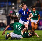 9 March 2019; Romane Menager of France evades the tackle of Enya Breen, left, and Aoife McDermott of Ireland during the Women's Six Nations Rugby Championship match between Ireland and France at Energia Park in Donnybrook, Dublin. Photo by Ramsey Cardy/Sportsfile