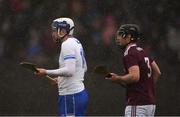 10 March 2019; Stephen Bennett of Waterford and Ronan Burke of Galway look on in a snow flurry during the Allianz Hurling League Division 1B Round 5 match between Waterford and Galway at Walsh Park in Waterford. Photo by Piaras Ó Mídheach/Sportsfile