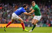 10 March 2019; Garry Ringrose of Ireland in action against Yoann Huget of France during the Guinness Six Nations Rugby Championship match between Ireland and France at the Aviva Stadium in Dublin. Photo by Ramsey Cardy/Sportsfile