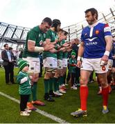 10 March 2019; Peter O’Mahony of Ireland with his daughter Indie watch as France players, lead by Maxime Medard, leave the field after the Guinness Six Nations Rugby Championship match between Ireland and France at the Aviva Stadium in Dublin. Photo by Matt Browne/Sportsfile