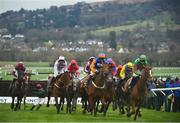12 March 2019; Runners and riders clear the last first time round as Glen Forsa, with Jonathan Burke up, second from left, falls during the Racing Post Arkle Challenge Trophy Novices' Chase on Day One of the Cheltenham Racing Festival at Prestbury Park in Cheltenham, England. Photo by David Fitzgerald/Sportsfile
