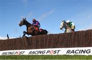 12 March 2019; Beware The Bear, with Jeremiah McGrath, up, left, jumps the last ahead of eventual second Vintage Clouds, with Danny Cook, up, on their way to winning the Ultima Handicap Chase on Day One of the Cheltenham Racing Festival at Prestbury Park in Cheltenham, England. Photo by David Fitzgerald/Sportsfile