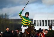 12 March 2019; Mark Walsh celebrates on Espoir D'Allen after winning the Unibet Champion Hurdle Challenge Trophy on Day One of the Cheltenham Racing Festival at Prestbury Park in Cheltenham, England. Photo by David Fitzgerald/Sportsfile
