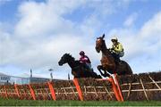 12 March 2019; Eventual second Melon, with Paul Townend, up, right, jump the last next to Apple's Jade, with Jack Kennedy, up, during the Unibet Champion Hurdle Challenge Trophy on Day One of the Cheltenham Racing Festival at Prestbury Park in Cheltenham, England. Photo by David Fitzgerald/Sportsfile