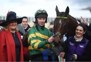 12 March 2019; Mark Walsh with Espoir D'Allen and winning conntections following the Unibet Champion Hurdle Challenge Trophy on Day One of the Cheltenham Racing Festival at Prestbury Park in Cheltenham, England. Photo by David Fitzgerald/Sportsfile