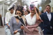 13 March 2019; Racegoers hold on to their hats prior to racing on Day Two of the Cheltenham Racing Festival at Prestbury Park in Cheltenham, England. Photo by David Fitzgerald/Sportsfile