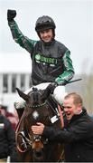 13 March 2019; Jockey Nico de Boinville celebrates as he enters the winners enclosure after winning the Betway Queen Mother Champion Chase on Altior on Day Two of the Cheltenham Racing Festival at Prestbury Park in Cheltenham, England. Photo by Seb Daly/Sportsfile