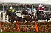13 March 2019; Band Of Outlaws, left, with JJ Slevin up, jumps the last, alongside eventual second place Coko Beach, right, with Jack Kennedy up, and eventual sixth place Praeceps, with Wayne Hutchinson up, on their way to winning the Boodles Juvenile Handicap Hurdle on Day Two of the Cheltenham Racing Festival at Prestbury Park in Cheltenham, England. Photo by Seb Daly/Sportsfile