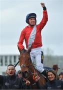 13 March 2019; Jockey Jamie Codd celebrates as he enters the winners enclosure after winning the Weatherbys Champion Bumper on Envoi Allen on Day Two of the Cheltenham Racing Festival at Prestbury Park in Cheltenham, England. Photo by Seb Daly/Sportsfile