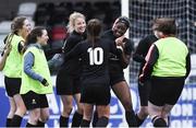 13 March 2019; Vanessa Ogbonna of University College Cork receives the congratulations from her team-mates after scoring the decisive penalty during the penalty shoot out in the WSCAI Kelly Cup Final match between University College Cork and Maynooth University at Seaview in Belfast. Photo by Oliver McVeigh/Sportsfile