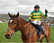 14 March 2019; Jockey Barry Geraghty celebrates after winning the JLT Novices' Chase on Defi Du Seuil on Day Three of the Cheltenham Racing Festival at Prestbury Park in Cheltenham, England. Photo by Seb Daly/Sportsfile