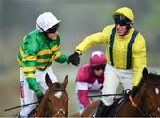 14 March 2019; Jockey Barry Geraghty, left, is congratulated by Robbie Power after winning the JLT Novices' Chase on Defi Du Seuil on Day Three of the Cheltenham Racing Festival at Prestbury Park in Cheltenham, England. Photo by Seb Daly/Sportsfile