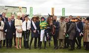 14 March 2019; Barry Geraghty and Defi Du Seuil with the winning connections after winning the JLT Novices' Chase on Day Three of the Cheltenham Racing Festival at Prestbury Park in Cheltenham, England. Photo by David Fitzgerald/Sportsfile