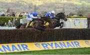 14 March 2019; Frodon, with Bryony Frost up, right, jumps the last alongside Aso, with Charlie Deutsch up, on their way to winning the Ryanair Chase on Day Three of the Cheltenham Racing Festival at Prestbury Park in Cheltenham, England. Photo by David Fitzgerald/Sportsfile