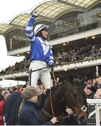 14 March 2019; Jockey Bryony Frost celebrates in front of the grandstand after winning the Ryanair Chase on Frodon on Day Three of the Cheltenham Racing Festival at Prestbury Park in Cheltenham, England. Photo by Seb Daly/Sportsfile
