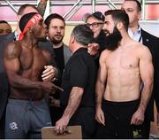 14 March 2019; Tevin Farmer and Jono Carroll, right, square off after weighing in ahead of their IBF World Super Featherweight Title bout at the Liacouras Center in Philadelphia, USA. Photo by Stephen McCarthy/Sportsfile