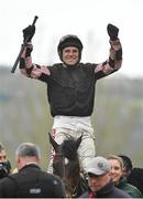 15 March 2019; Jockey Harry Skelton celebrates as he enters the winners enclosure after winning the Randox Health County Handicap Hurdle on Ch'tibello on Day Four of the Cheltenham Racing Festival at Prestbury Park in Cheltenham, England. Photo by Seb Daly/Sportsfile