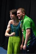 15 March 2019; Team Ireland's John Keenan, a member of the St.Hilda's Special School, from Ballymore, Co. Westmeath, poses for a photographer with his coach Anthony Monaghan, right, after his the pommel horse routine during the Artistic Gymnastic events on Day One of the 2019 Special Olympics World Games in the Abu Dhabi National Exhibition Centre, Abu Dhabi, United Arab Emirates. Photo by Ray McManus/Sportsfile