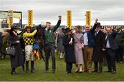 15 March 2019; Winning connections including jockey Paul Townend and trainer Willie Mullins after sending out Al Boum Photo to win the Magners Cheltenham Gold Cup Chase on Day Four of the Cheltenham Racing Festival at Prestbury Park in Cheltenham, England. Photo by Seb Daly/Sportsfile