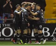15 March 2019; Dudalk players celebrate after Pat Hoban of Dundalk, hidden, scored his side's second goal from a penalty during the SSE Airtricity League Premier Division match between Derry City and Dundalk at Ryan McBride Brandywell Stadium in Derry Photo by Oliver McVeigh/Sportsfile