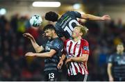 15 March 2019; Jamie McGrath and Dean Jarvis of Dundalk in action against Greg Sloggett of Derry City during the SSE Airtricity League Premier Division match between Derry City and Dundalk at Ryan McBride Brandywell Stadium in Derry Photo by Oliver McVeigh/Sportsfile