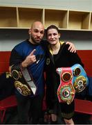 15 March 2019; Katie Taylor celebrates in her dressing room, with her coach Ross Enamait, after defeating Rose Volante in their WBA, IBF & WBO Female Lightweight World Championships unification bout at the Liacouras Center in Philadelphia, USA. Photo by Stephen McCarthy / Sportsfile