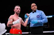 15 March 2019; John Joe Nevin with referee Eric Dali after his lightweight contest with Andres Figueroa at the Liacouras Center in Philadelphia, USA. Photo by Stephen McCarthy / Sportsfile