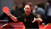 16 March 2019; Team Ireland's Francis Power, a member of Navan Arch Club, from Navan, Co. Meath, returns serve from Boudewijn Vanderydt of Belgium during his final set which he won 11-1 to win his match 3-2 during the Finals 29+ Division 4 at the Table Tennis matches on Day Two of the 2019 Special Olympics World Games in the Abu Dhabi National Exhibition Centre, Abu Dhabi, United Arab Emirates. Photo by Ray McManus/Sportsfile