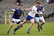 16 March 2019; Conor McCarthy of Monaghan, right, in action against Conor Moynagh of Cavan during the Allianz Football League Division 1 Round 6 match between Monaghan and Cavan at St Tiernach's Park in Clones, Monaghan. Photo by Oliver McVeigh/Sportsfile